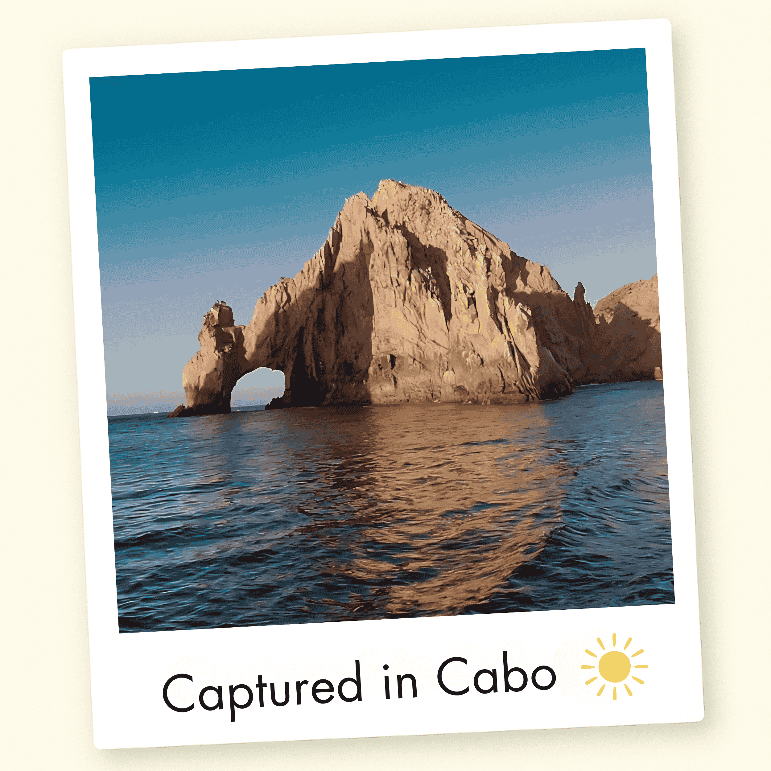 Rock formation with arch over water, labeled 'Captured in Cabo'.
